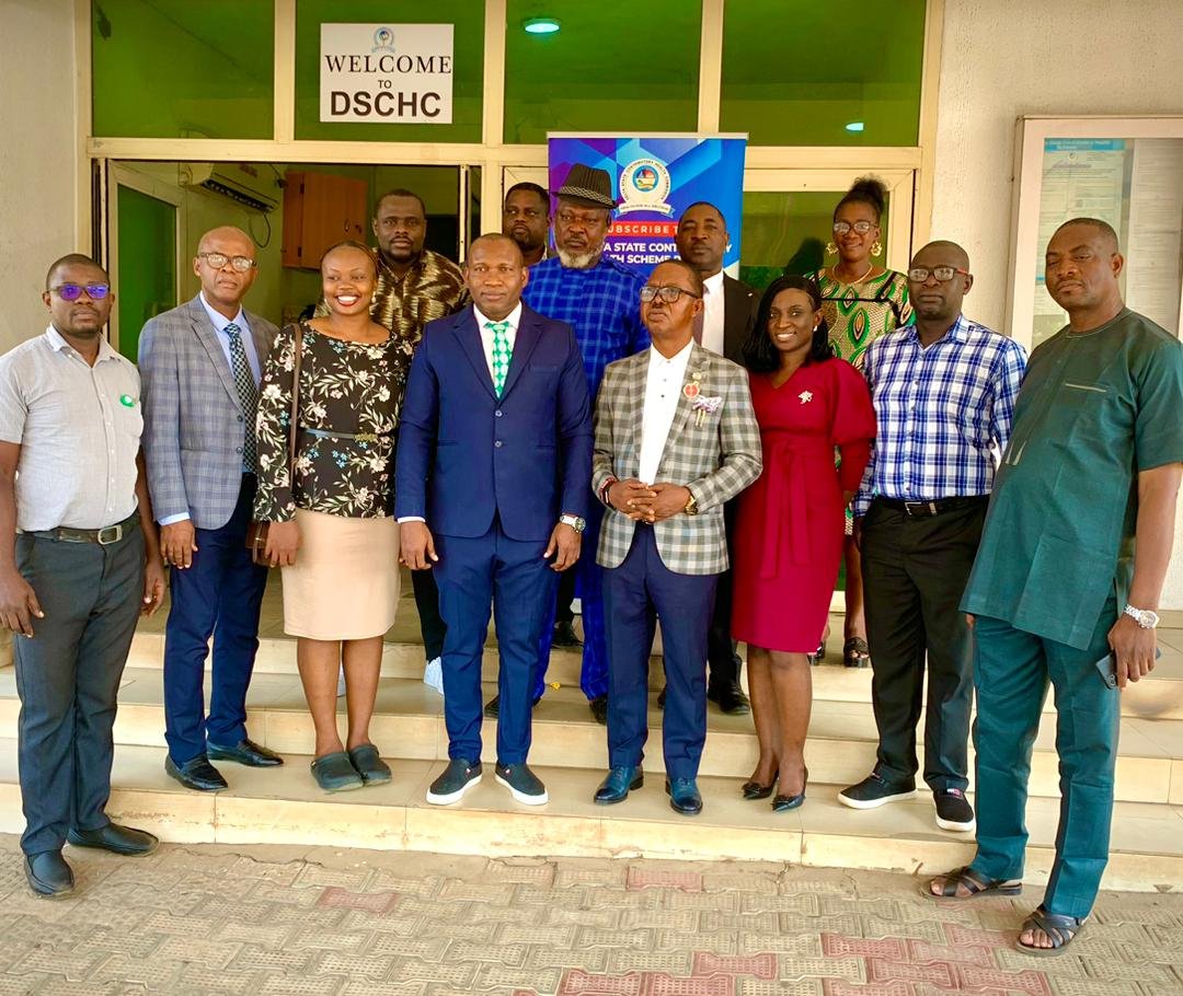 Residents and DSCHC stakeholders at a public enrolment advocacy visit